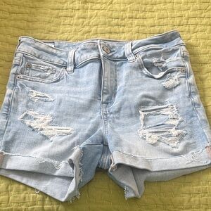 American Eagle Outfitters Light Blue Ripped Jean Shorts Next Level Midi shorts